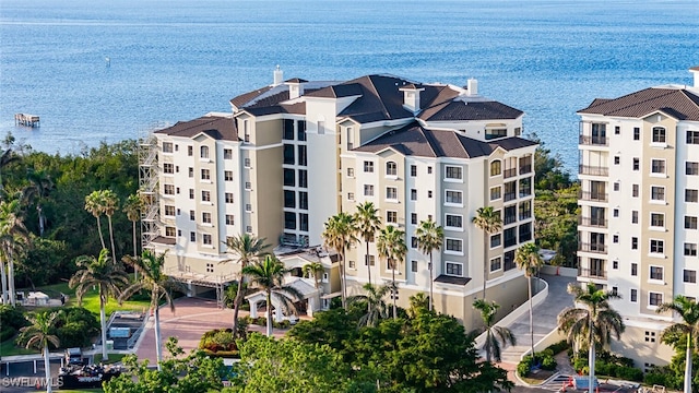 view of property with a water view