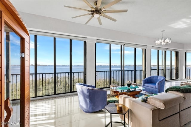 11640 Court Of Palms Unit 602, Fort Myers, FL 33908 - sunroom / solarium featuring a chandelier, a wealth of natural light, and a water view
