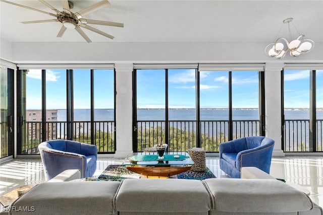 11640 Court Of Palms Unit 602, Fort Myers, FL 33908 - sunroom featuring a water view, a wealth of natural light, and a notable chandelier