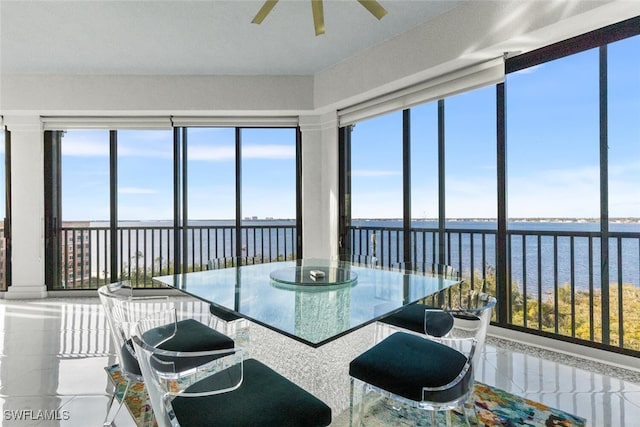 11640 Court Of Palms Unit 602, Fort Myers, FL 33908 - sunroom / solarium with plenty of natural light and a water view