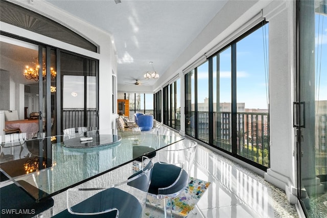 11640 Court Of Palms Unit 602, Fort Myers, FL 33908 - sunroom / solarium featuring a notable chandelier