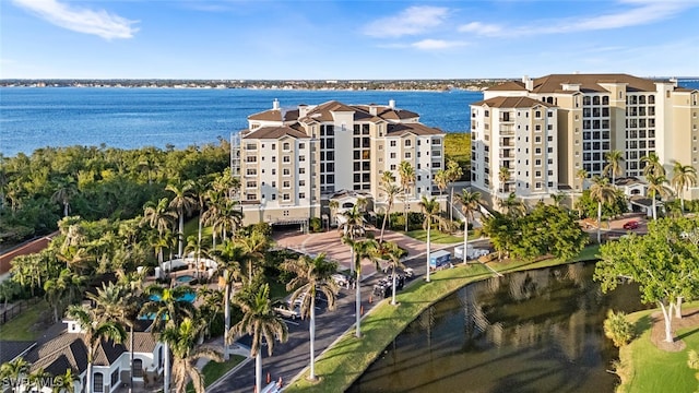 drone / aerial view with a water view