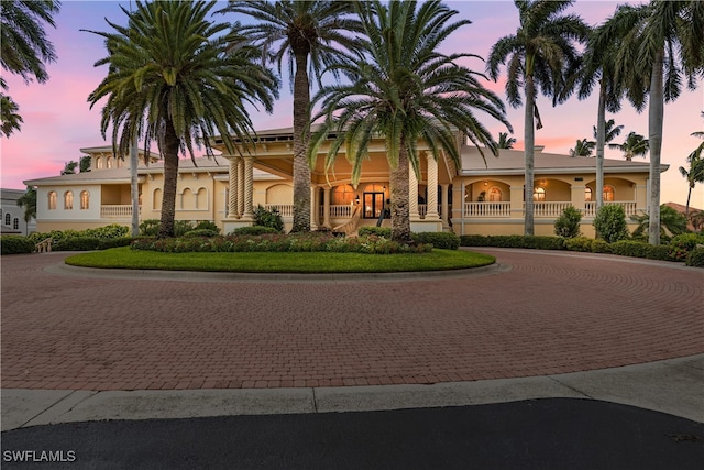 mediterranean / spanish-style home featuring a porch