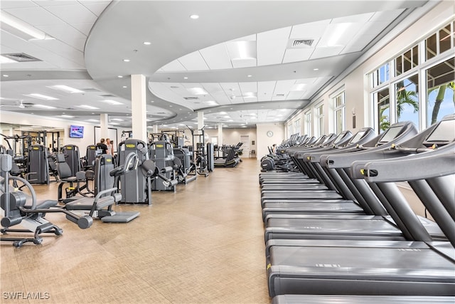 workout area featuring a drop ceiling