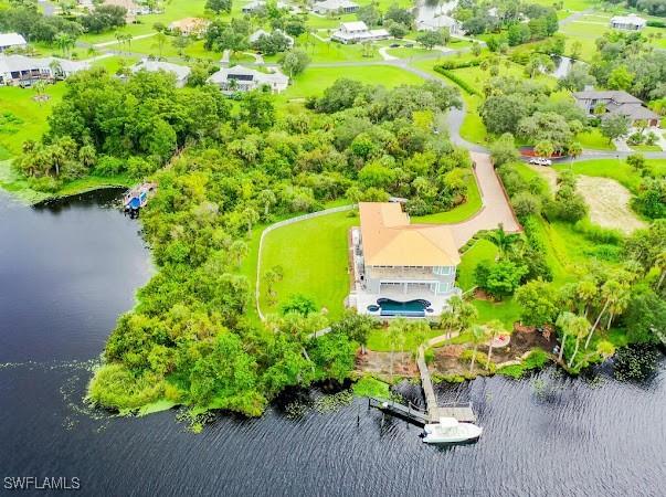 bird's eye view with a water view