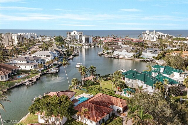 birds eye view of property featuring a water view