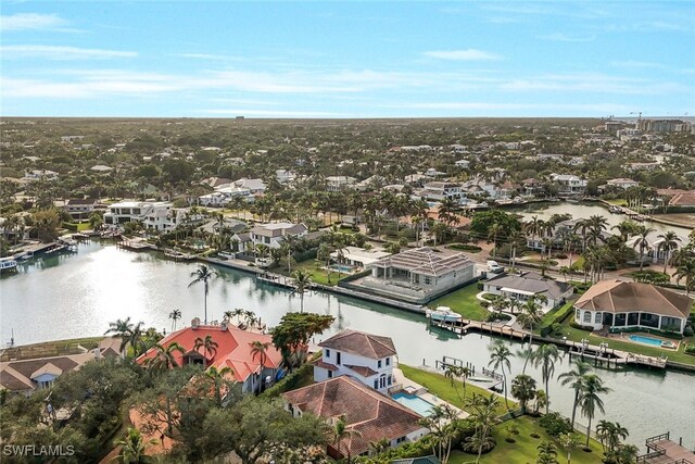 birds eye view of property featuring a water view and a residential view