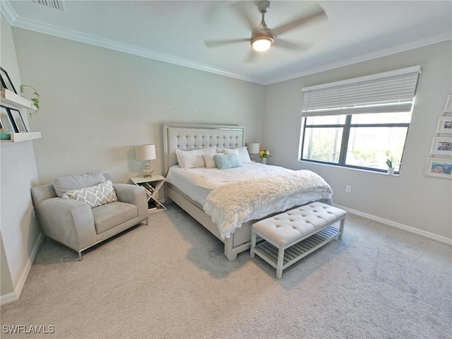 bedroom with ceiling fan, light colored carpet, and ornamental molding