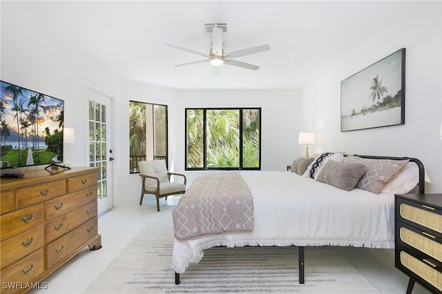 bedroom with access to outside and ceiling fan