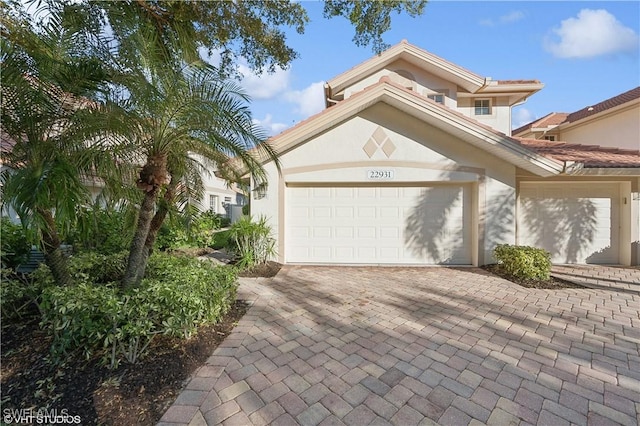 view of front of home with a garage