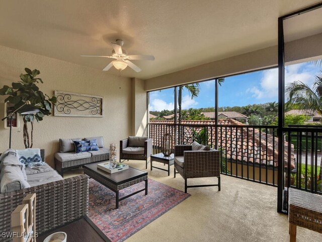 exterior space with ceiling fan