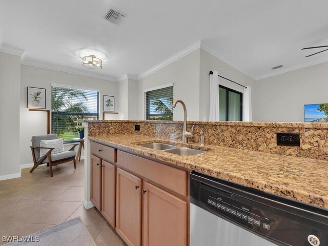 kitchen featuring sink, light tile patterned floors, ornamental molding, and stainless steel dishwasher