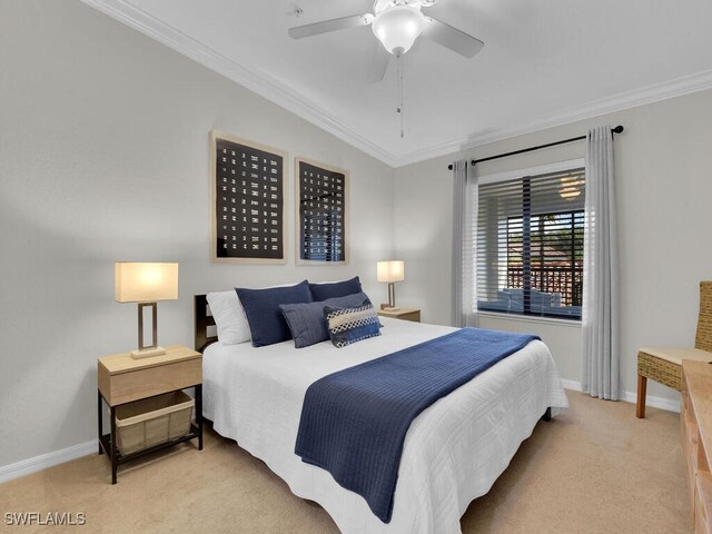 carpeted bedroom with crown molding and ceiling fan