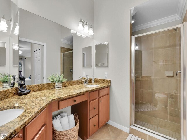 bathroom featuring walk in shower, tile patterned floors, toilet, ornamental molding, and vanity