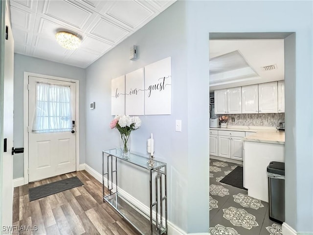 doorway to outside featuring hardwood / wood-style flooring