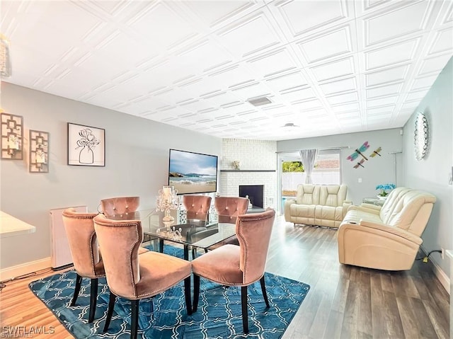 dining space featuring hardwood / wood-style floors