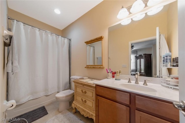 full bathroom featuring tile patterned flooring, vanity, shower / bath combination with curtain, and toilet