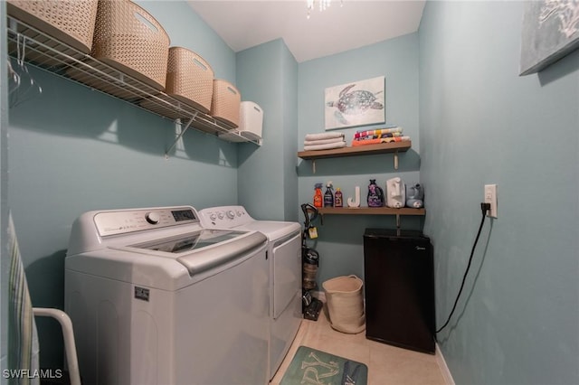 clothes washing area featuring washing machine and clothes dryer