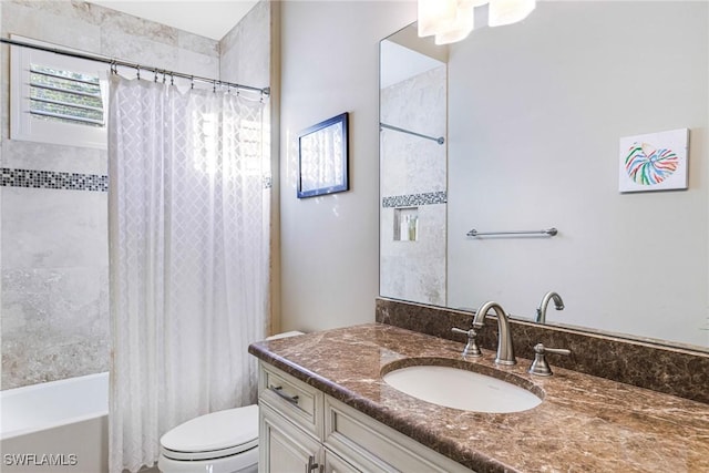 full bathroom featuring toilet, vanity, and shower / tub combo