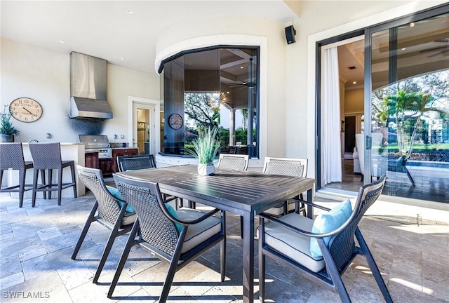 view of patio featuring a grill and an outdoor kitchen