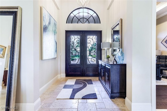 entrance foyer featuring french doors