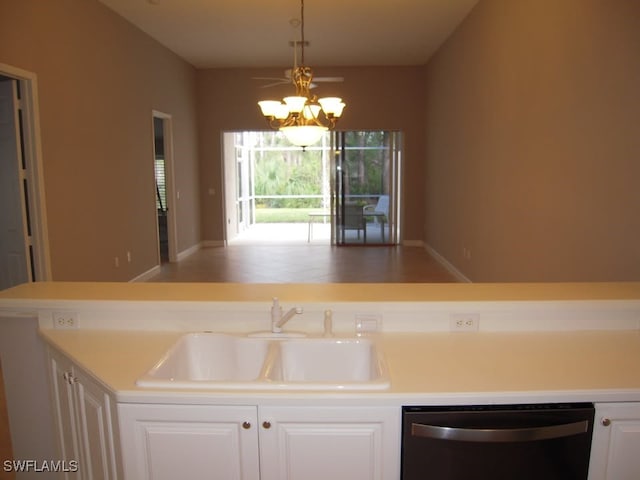 kitchen with white cabinetry, dishwasher, sink, a chandelier, and pendant lighting