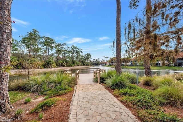 view of home's community featuring a water view