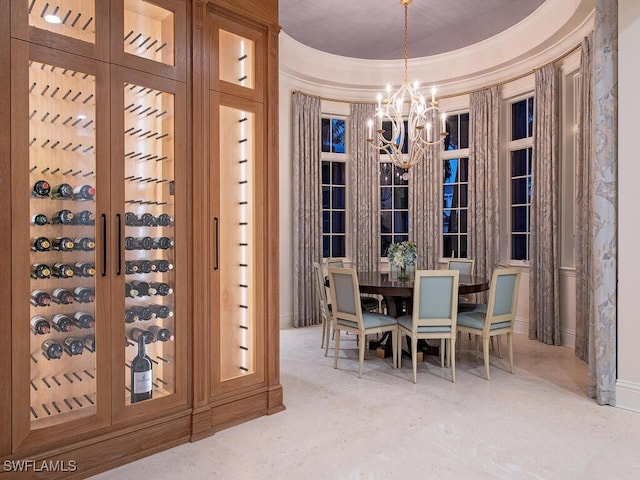 unfurnished dining area featuring a chandelier, crown molding, and a raised ceiling