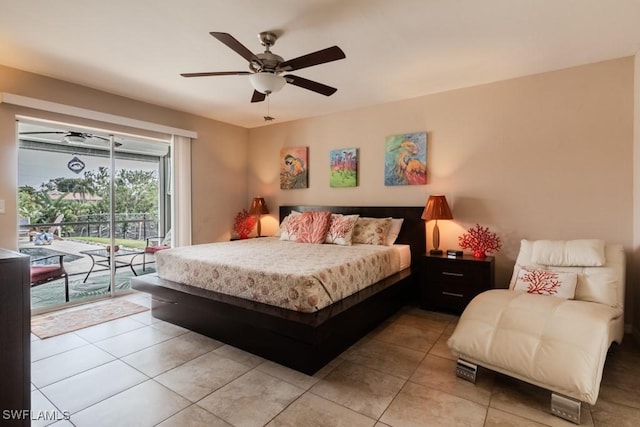 bedroom featuring access to exterior, light tile patterned floors, and ceiling fan