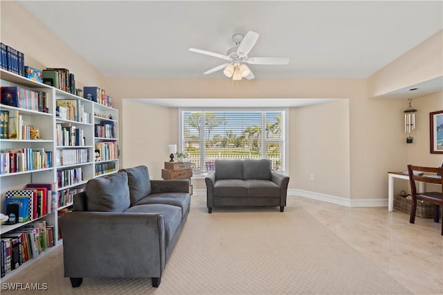 sitting room with ceiling fan