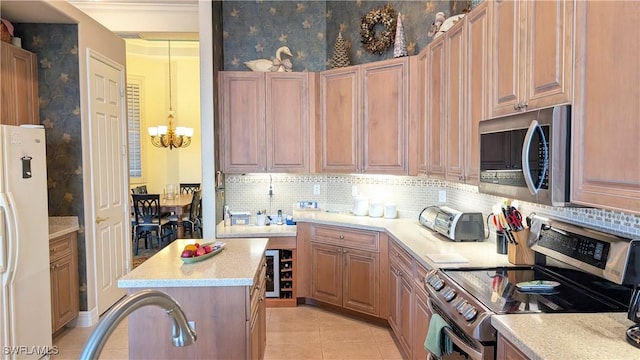 kitchen with a center island, light tile patterned floors, tasteful backsplash, a notable chandelier, and stainless steel appliances