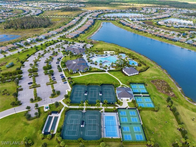 bird's eye view with a water view