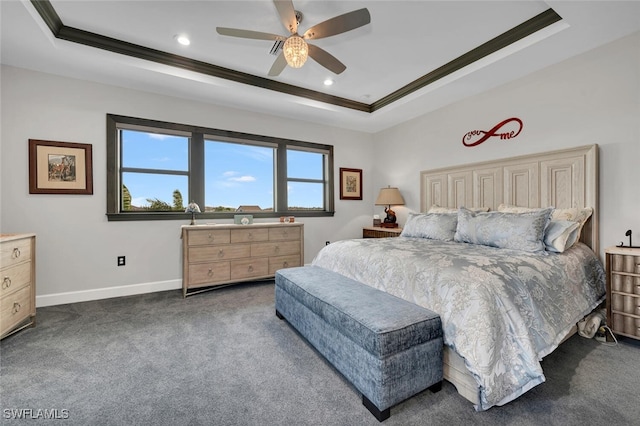 bedroom with carpet, ceiling fan, a tray ceiling, and crown molding