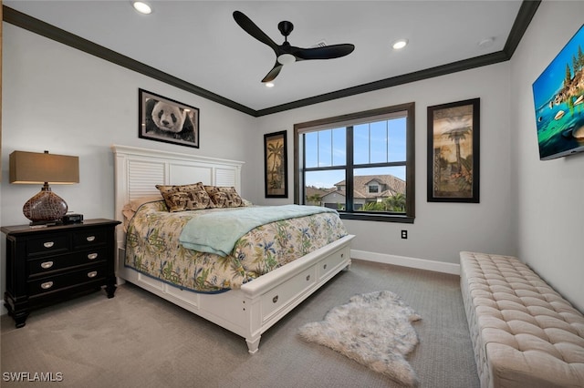 bedroom with ceiling fan, crown molding, and light carpet