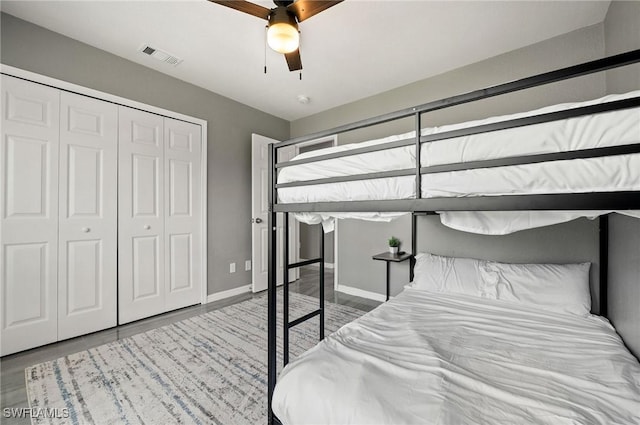 unfurnished bedroom featuring a closet and ceiling fan