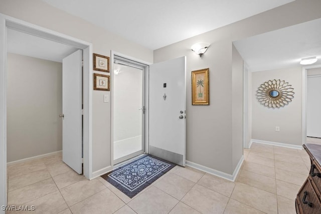 view of tiled foyer entrance