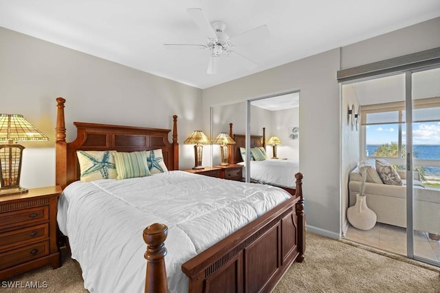 bedroom with access to outside, ceiling fan, and light carpet