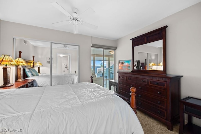 carpeted bedroom featuring ceiling fan and a closet