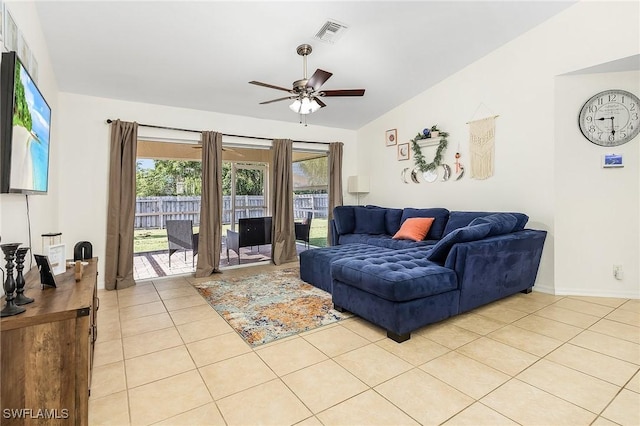 living room featuring ceiling fan and light tile patterned floors