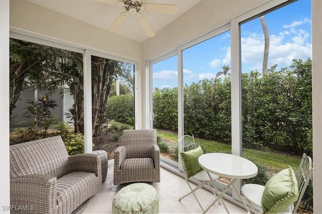 sunroom / solarium with ceiling fan