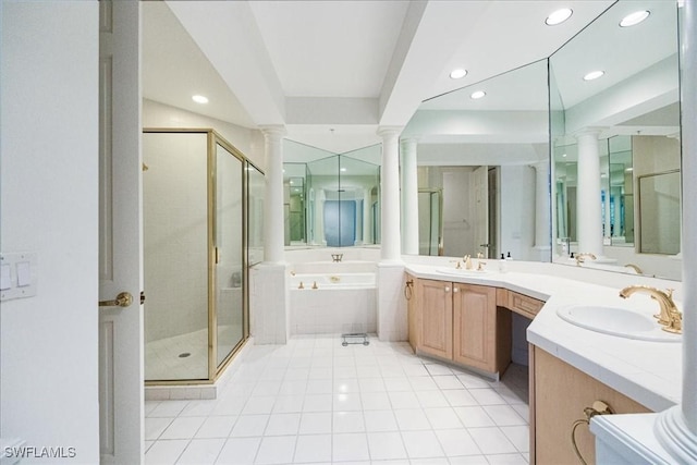 bathroom with plus walk in shower, vanity, and tile patterned floors