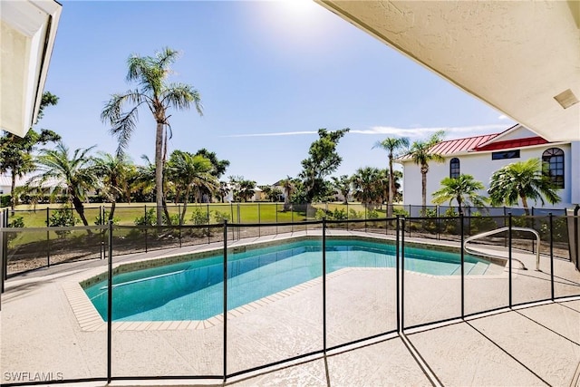 view of pool featuring a patio area