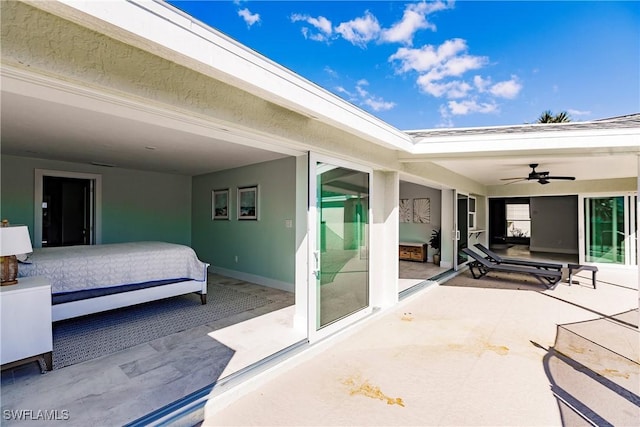 view of patio / terrace featuring ceiling fan