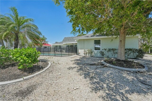 1298 Par View Dr, Sanibel, FL 33957 - back of property featuring stucco siding