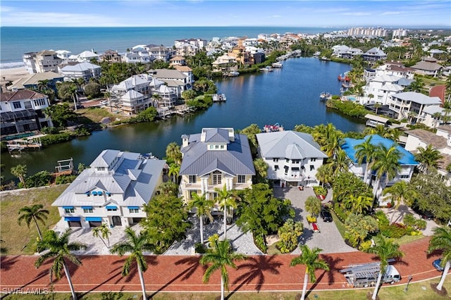 drone / aerial view with a water view