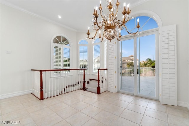 interior space with crown molding, light tile patterned floors, and an inviting chandelier