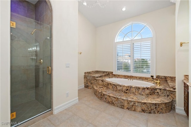 bathroom with vanity, tile patterned floors, and independent shower and bath