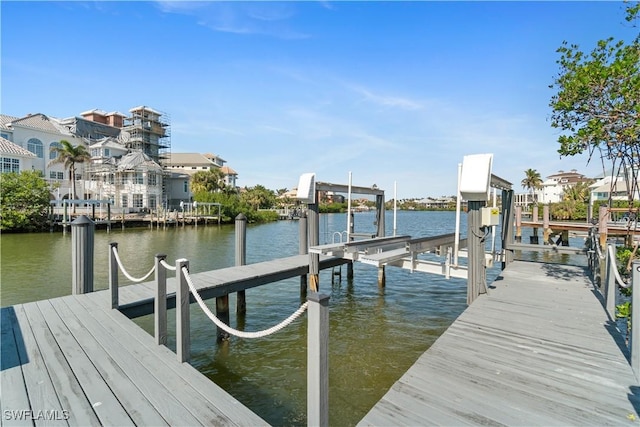 dock area with a water view