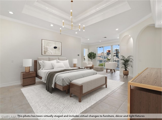 tiled bedroom featuring a chandelier, a raised ceiling, and ornamental molding