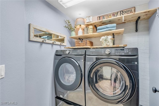 laundry area with separate washer and dryer